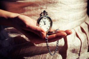 pocket watch in hand, gift of time